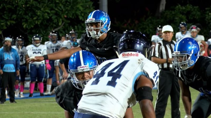 RJ Javar lines up in shotgun in first half against Kailua. Menehune defeated the Surfriders...