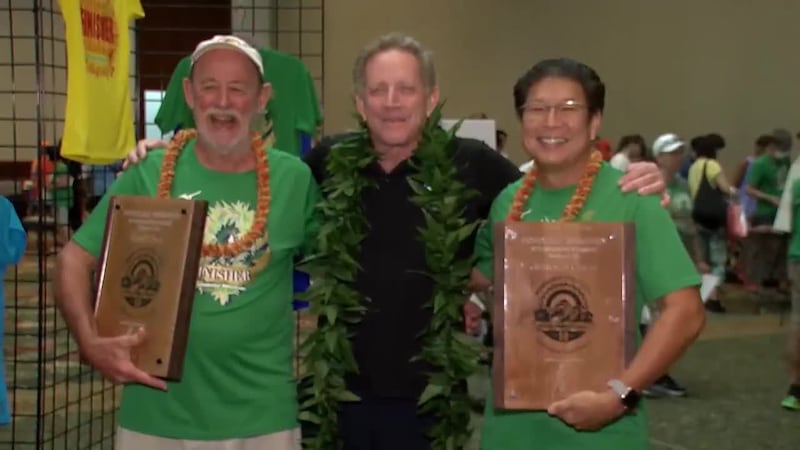 Jerold Chun (right) and Gary Dill (left) was honored in 2022 for running the Honolulu Marathon...