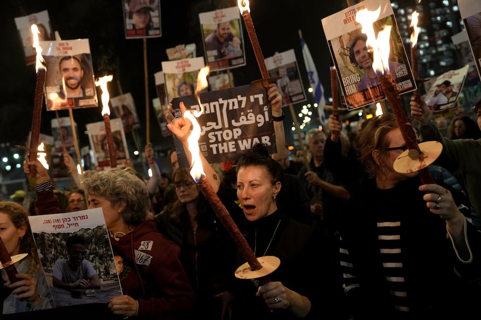 Relatives and friends of people killed and abducted by Hamas and taken into Gaza, react to the...